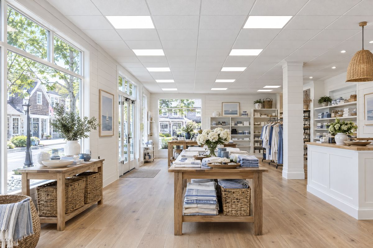 Bright shop with a new white drop ceiling and rows of flat LED panels